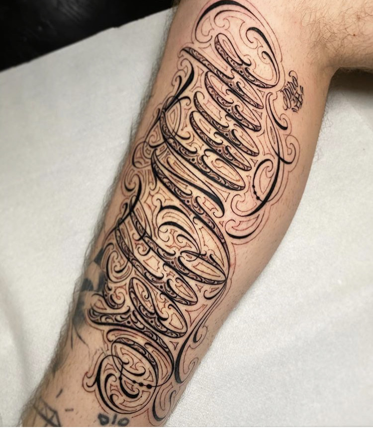 Tattoo chicano scritte